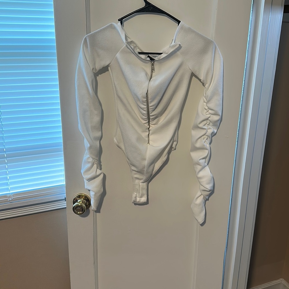 White ruffled bodysuit